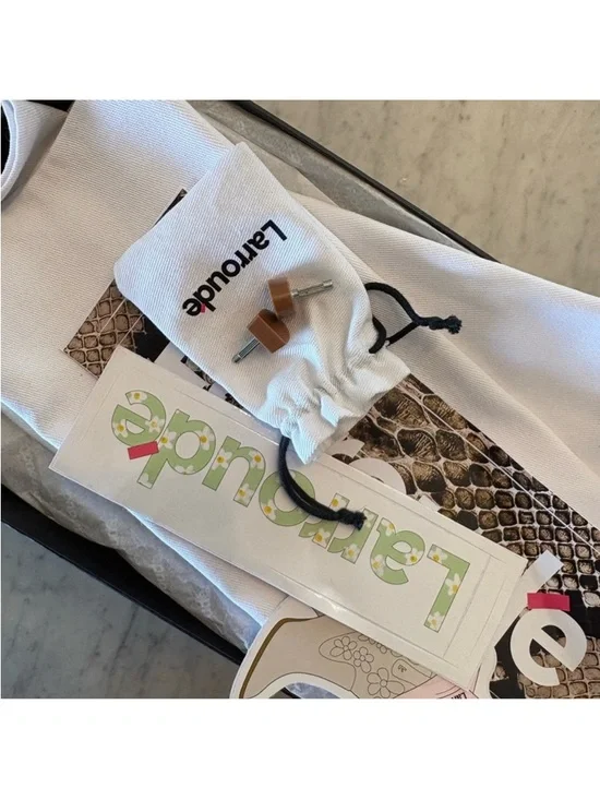 Larroude Cream Slide Mules with Floral Accent - Picture 8 of 9